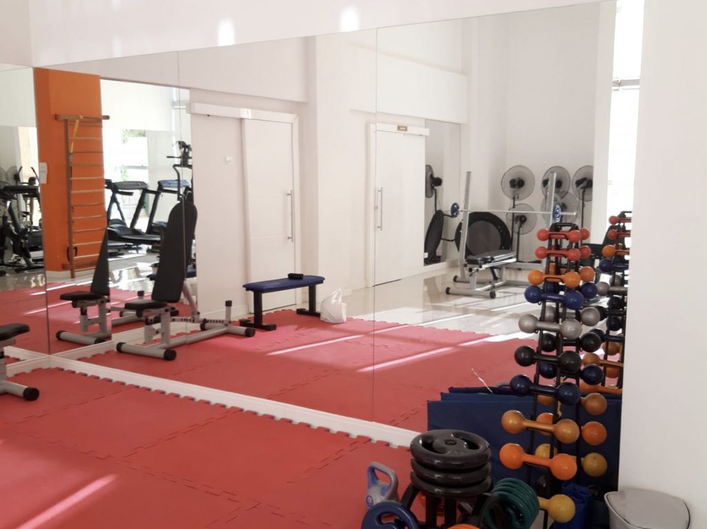 home gym mirror red floor